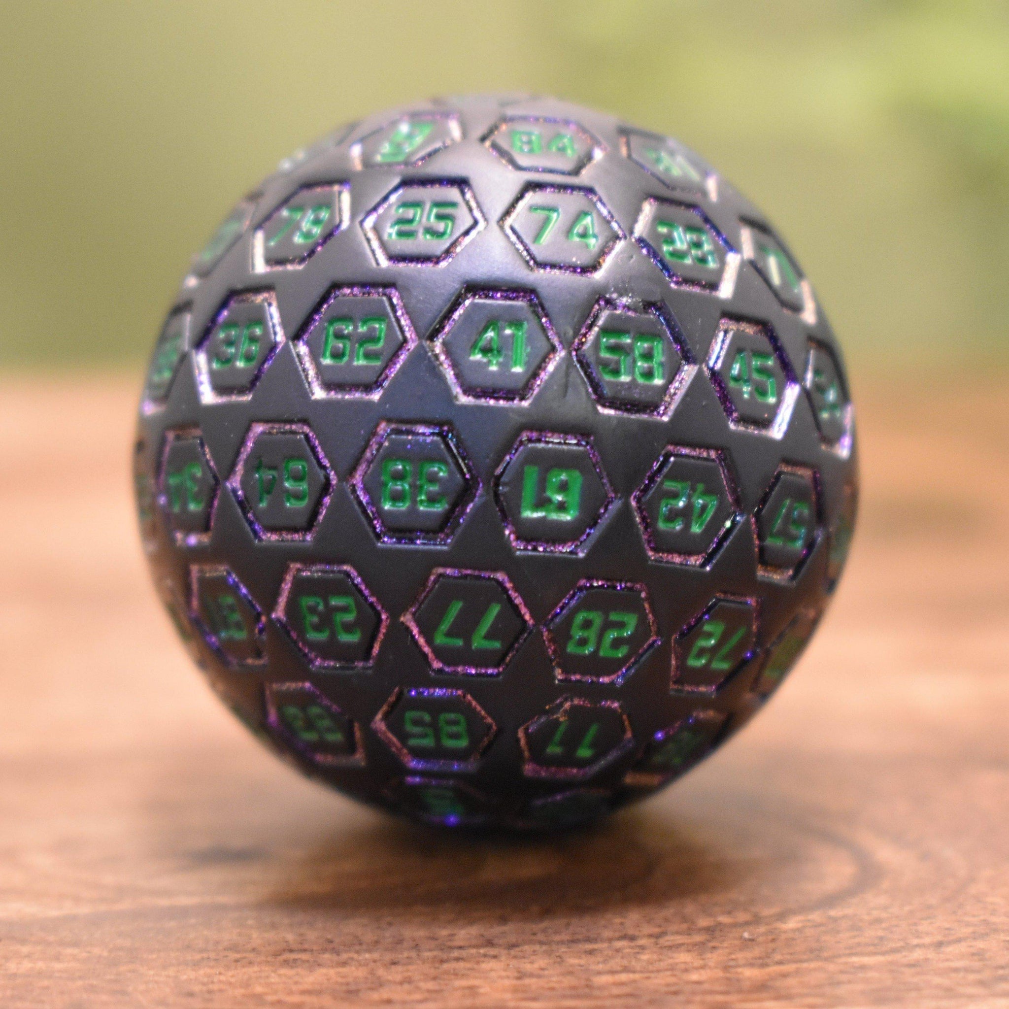 The Orb D100 - Purple, Green, and Black Metal Die - Misty Mountain Gaming - 1