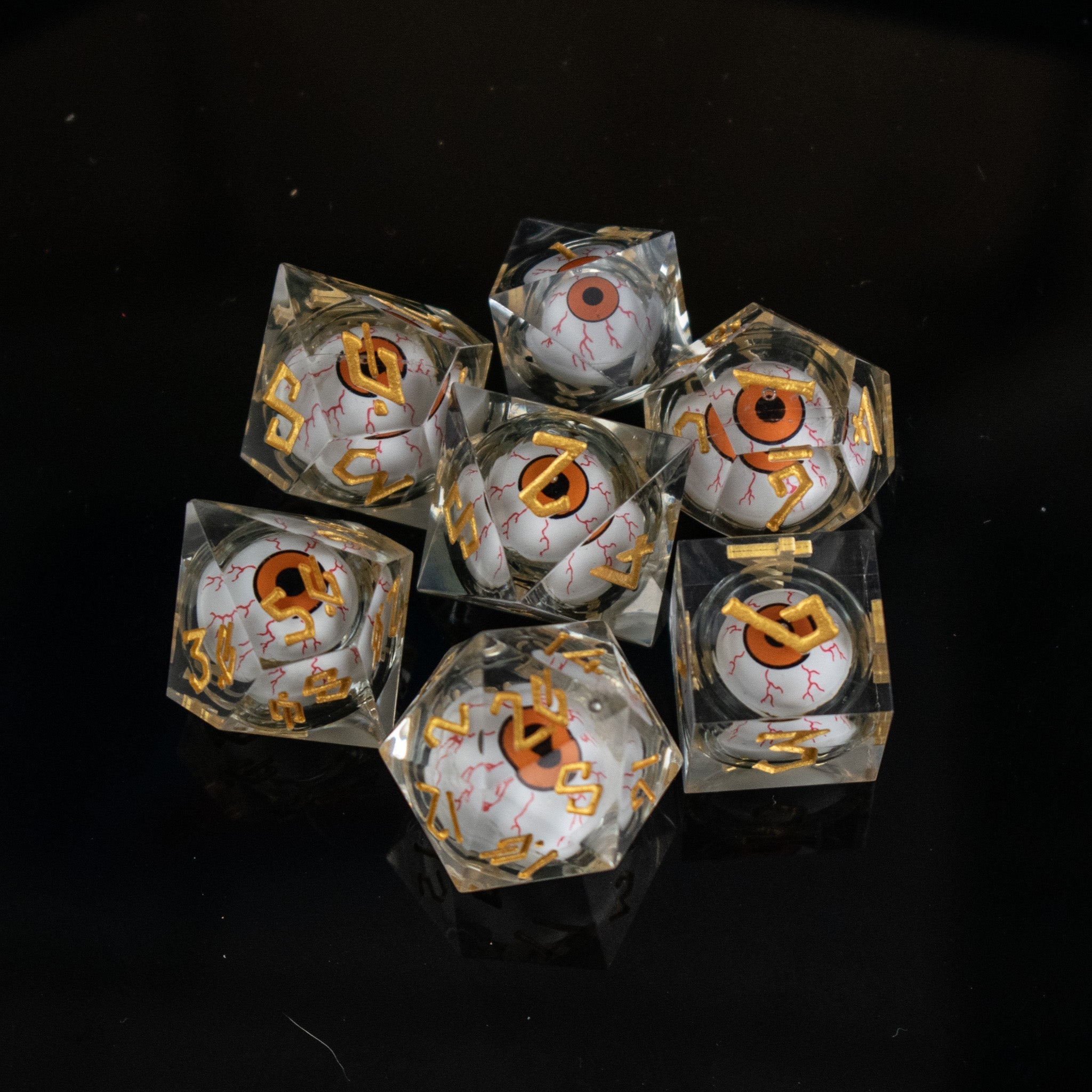 The Watcher: Orange - Eyed Liquid Core Dice Set - Misty Mountain Gaming - 1